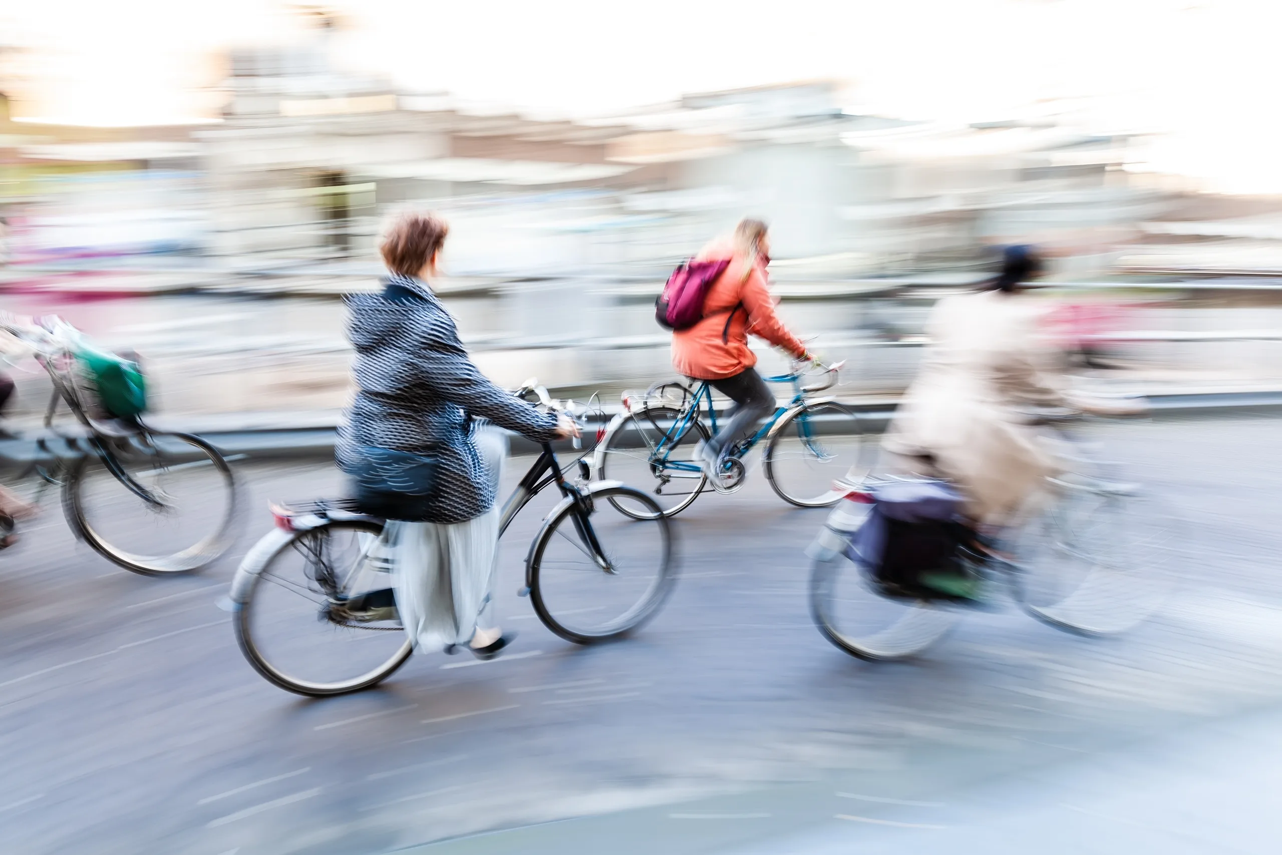 a group of people riding Bicycles